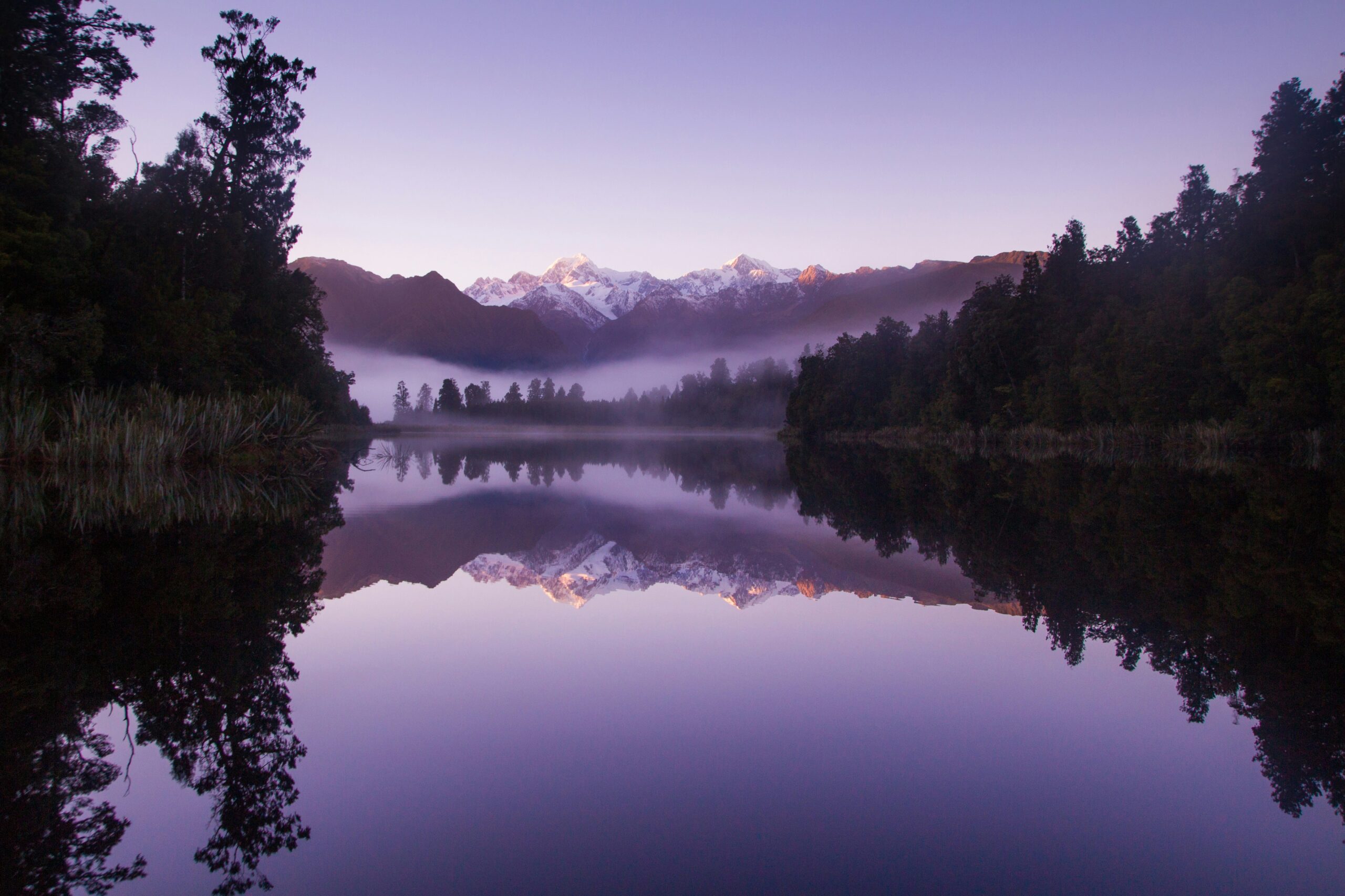 Purple mountain lake reflection
